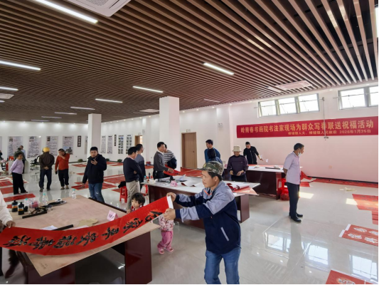 【镇街人大】樟铺镇人大：开展“翰墨传情迎新春，人大送福暖民心”写春联送祝福活动298.png